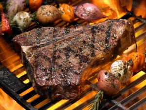 T-bone steak on BBQ