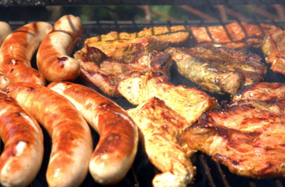 variety of meat on the grill