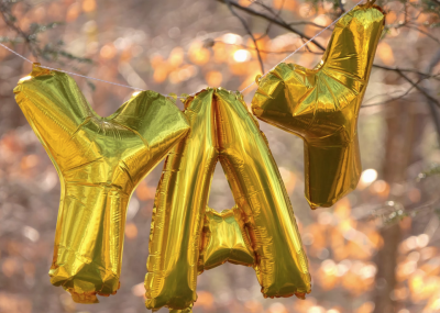 Y A Y (balloons hanging)